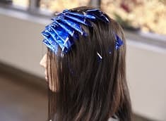 multiple foil pieces on hair