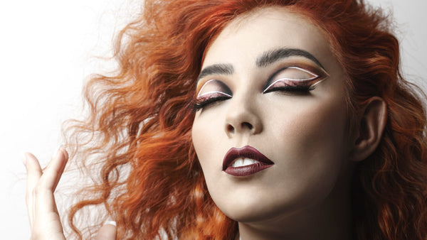 Woman with curly red hair