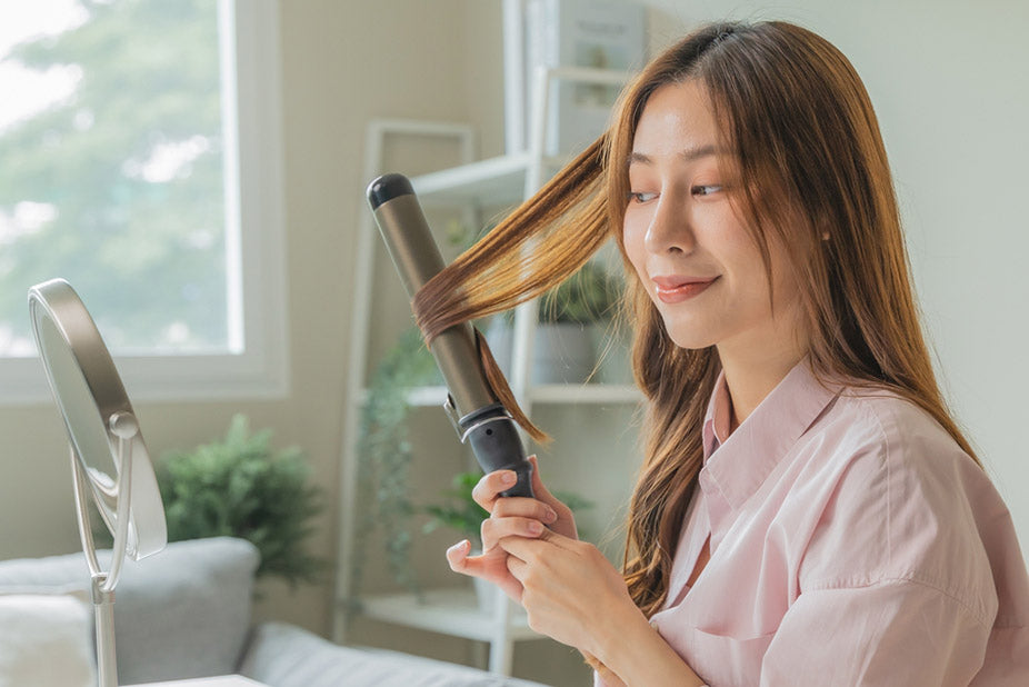 makeup routine of a young woman