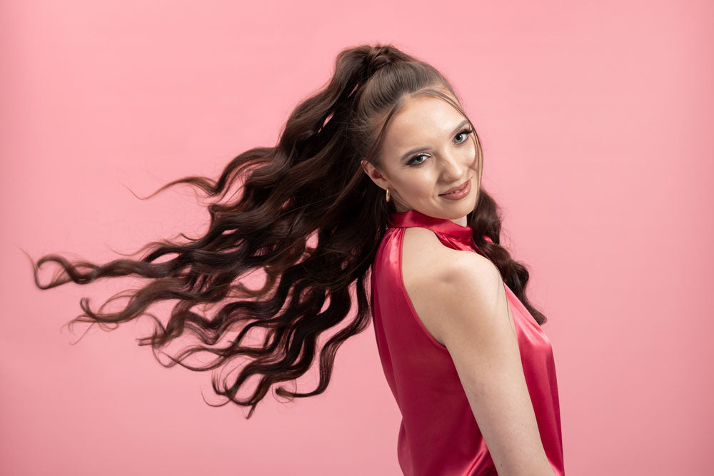 smiling portrait wearing ponytail