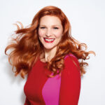 smiling woman with red hair