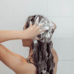 washing hair in shower